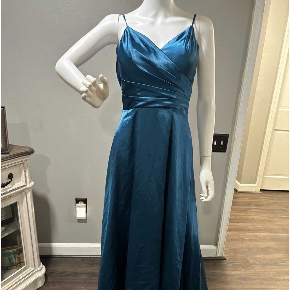 bluish  sapphire color. had altered I am 5 ft but worse 5 inch heels.